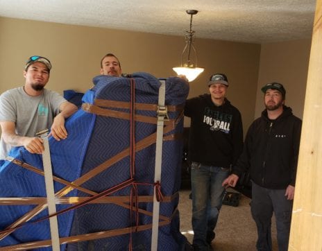 moving baby grand on wheels park-city-moving